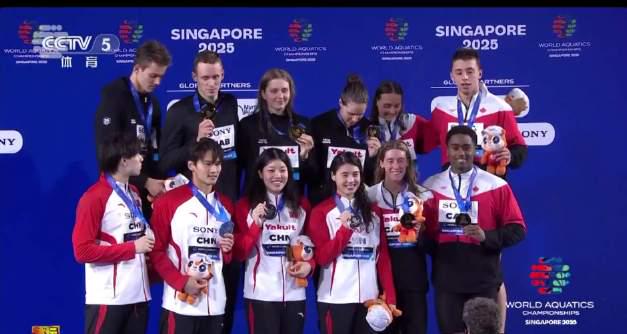 Breaking News: Chinese Swimmer Qin Haiyang Makes History with Triple Medal Haul at World Championships!