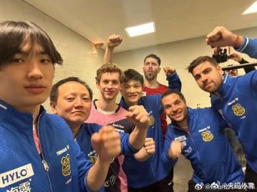 Fan Zhendong Surrounded by Teammates in Heartwarming Group Photo